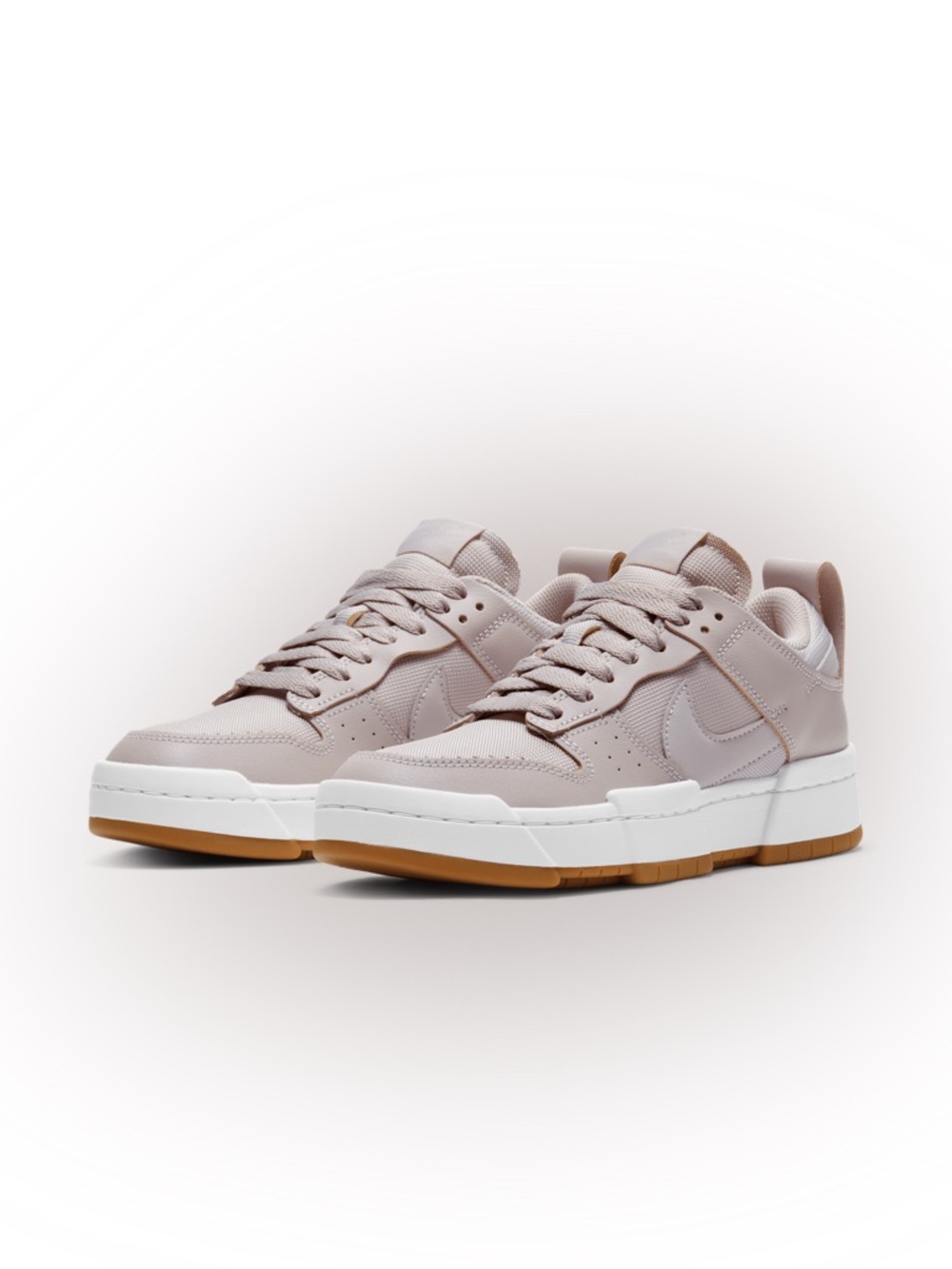 Woman’s dunk low disrupt platinum violet